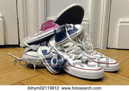 Sport shoes of a family with two children View Large Photo Image Stock Image - Sport shoes of a family with two children. Fotosearch