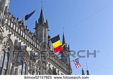 Stadhuis, city hall, with Belgian flag, Grote Markt square, old town of Bruges, UNESCO World Heritage Site, West Flanders, Flemish Region, Bruges, Belgium, Europe View Large Photo Image Stock Photography - Stadhuis, city hall, with Belgian flag, Grote Markt square, old town of Bruges, UNESCO World Heritage Site, West Flanders, Flemish Region, Bruges, Belgium, Europe. Fotosearch