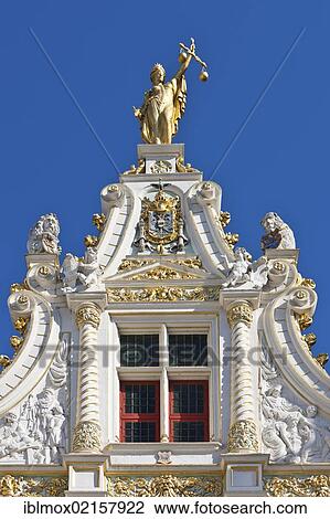 Statue of Justice on the gilded facade of Civiele Griffie, records office, old town of Bruges, UNESCO World Heritage Site, West Flanders, Flemish Region, Bruges, Belgium, Europe View Large Photo Image Stock Image - Statue of Justice on the gilded facade of Civiele Griffie, records office, old town of Bruges, UNESCO World Heritage Site, West Flanders, Flemish Region, Bruges, Belgium, Europe. Fotosearch