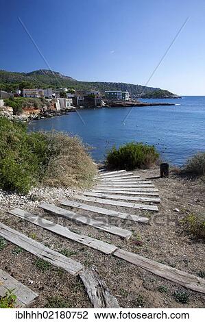 Steps to the beach, Sant Elm, southwest coast, Majorca, Balearic Islands, Spain, Europe View Large Photo Image Stock Image - Steps to the beach, Sant Elm, southwest coast, Majorca, Balearic Islands, Spain, Europe. Fotosearch