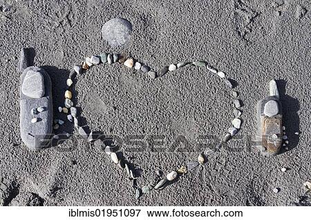 Stone cell phones and heart View Large Photo Image Stock Photo - Stone cell phones and heart. Fotosearch