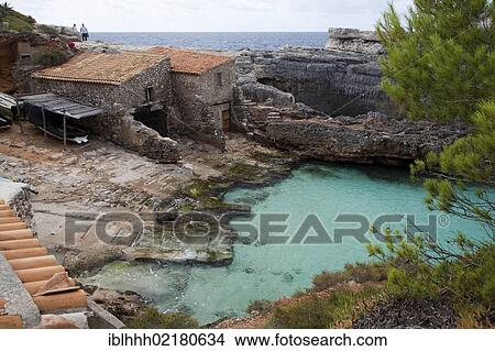 Stone houses, Cala s'Almunia, southeast coast, Majorca, Balearic Islands, Spain, Europe View Large Photo Image Picture - Stone houses, Cala s'Almunia, southeast coast, Majorca, Balearic Islands, Spain, Europe. Fotosearch