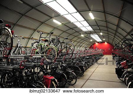 Storage for bicycles at Rotterdam railway station, typical storage for bicycles at railway stations in Holland, Nederland, the Netherlands, Europe View Large Photo Image Stock Photo - Storage for bicycles at Rotterdam railway station, typical storage for bicycles at railway stations in Holland, Nederland, the Netherlands, Europe. Fotosearch