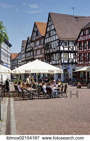 Street cafes in the historic centre of Gruenberg, Hesse, Germany, Europe, PublicGround, Europe View Large Photo Image Stock Photo - Street cafes in the historic centre of Gruenberg, Hesse, Germany, Europe, PublicGround, Europe. Fotosearch