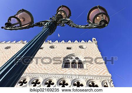 Stock Photography - Street lamp in front of Doge's Palace at Piazza San Marco in Venice, Italy, Europe. Fotosearch