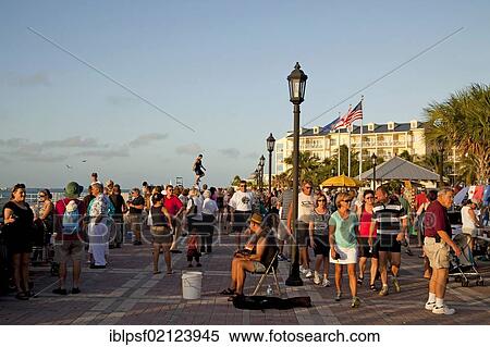Street performer and pedestrians on Mallory Square in Key West, Florida Keys, Florida, USA, North America View Large Photo Image Stock Photography - Street performer and pedestrians on Mallory Square in Key West, Florida Keys, Florida, USA, North America. Fotosearch