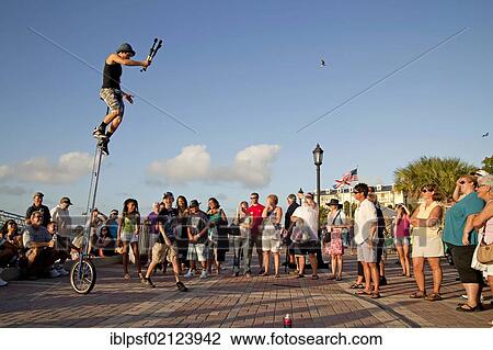 Street performers and spectators at Mallory Square in Key West, Florida Keys, Florida, USA, North America View Large Photo Image Stock Image - Street performers and spectators at Mallory Square in Key West, Florida Keys, Florida, USA, North America. Fotosearch