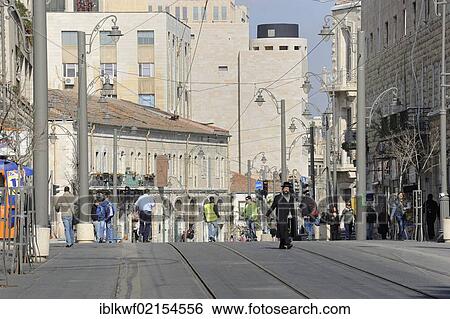 Street scene on the Jaffa Road with Orthodox Jews and the rails of the new tram line, light rail, Jerusalem, Israel, Middle East, Southwest Asia, Asia View Large Photo Image Stock Photograph - Street scene on the Jaffa Road with Orthodox Jews and the rails of the new tram line, light rail, Jerusalem, Israel, Middle East, Southwest Asia, Asia. Fotosearch