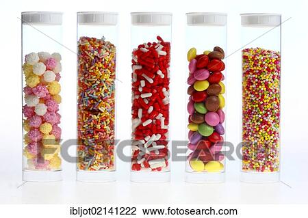 Stock Image - Sugar pearls and sprinkles, decoration for cakes and other desserts. Fotosearch