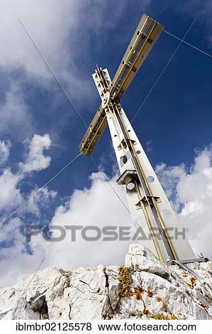 Summit cross of Sassongher Mountain above Corvara, Puez Group, Puez Geisler Nature Park, Dolomites, Alto Adige, Italy, Europe View Large Photo Image Stock Photo - Summit cross of Sassongher Mountain above Corvara, Puez Group, Puez Geisler Nature Park, Dolomites, Alto Adige, Italy, Europe. Fotosearch