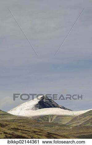 Stock Image - Summit of Hogronden Mountain, covered with snow, Rondane National Park, Norway, Europe. Fotosearch