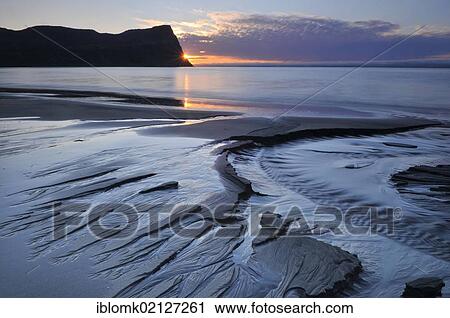 Stock Image - Sunset, mouth of the Horná creek in Hloeðuvík, Hloeduvik, Hornstrandir, Westfjords, Iceland, Europe. Fotosearch