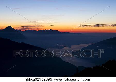 Sunset over Lake Thun, Thuner See, view from Schynige Platte mountain region, Bernese Oberland, Switzerland, Europe View Large Photo Image Stock Photography - Sunset over Lake Thun, Thuner See, view from Schynige Platte mountain region, Bernese Oberland, Switzerland, Europe. Fotosearch