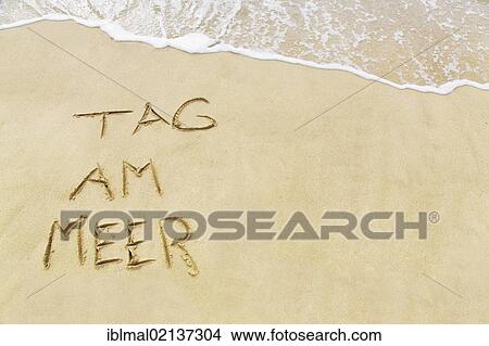 Tag am Meer, German for Day by the Sea, written in the sand on a beach, Lanzarote, Canary Islands, Spain, Europe View Large Photo Image Picture - Tag am Meer, German for Day by the Sea, written in the sand on a beach, Lanzarote, Canary Islands, Spain, Europe. Fotosearch