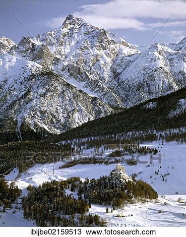Stock Image - Tarasp Fontana with Tarasp Castle, Sesvenna Group, Piz San Jon Dadora, Lower Engadine, Engadine, Grisons, Switzerland, Europe. Fotosearch