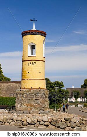 Stock Photography - The famous yellow bell tower from 1857, Nordby, Samsoe, Denmark, Europe. Fotosearch