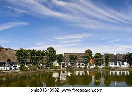 Stock Image - The idyllic area around the village pond, Nordby, Samsoe, Denmark, Europe. Fotosearch