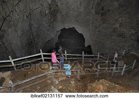 The Japanese Cave, Goa Jepang, a tourist attraction being visited by Javanese visitors, Battle of Biak, Pacific War, near Kota Biak on Biak Island in Irian Jaya, West Papua, Indonesia, Southeast Asia, Asia View Large Photo Image Stock Photo - The Japanese Cave, Goa Jepang, a tourist attraction being visited by Javanese visitors, Battle of Biak, Pacific War, near Kota Biak on Biak Island in Irian Jaya, West Papua, Indonesia, Southeast Asia, Asia. Fotosearch