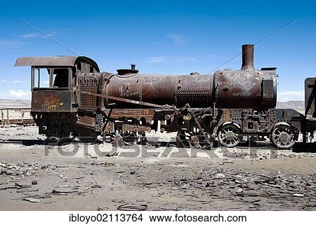 Picture - The train cemetery, Salar de Uyuni or salt desert of Uyuni, Bolivia, South America. Fotosearch