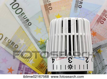 Thermostatic central heating valve, radiator valve, hot and cold marks, on euro banknotes, symbolic images for heating and energy costs View Large Photo Image Stock Photo - Thermostatic central heating valve, radiator valve, hot and cold marks, on euro banknotes, symbolic images for heating and energy costs. Fotosearch