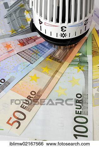 Thermostatic central heating valve, radiator valve, hot and cold marks, on euro banknotes, symbolic images for heating and energy costs View Large Photo Image Stock Photograph - Thermostatic central heating valve, radiator valve, hot and cold marks, on euro banknotes, symbolic images for heating and energy costs. Fotosearch