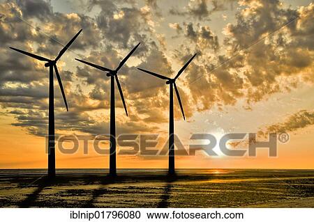 Three windturbines at sunset, Denmark, Europe View Large Photo Image Stock Image - Three windturbines at sunset, Denmark, Europe. Fotosearch