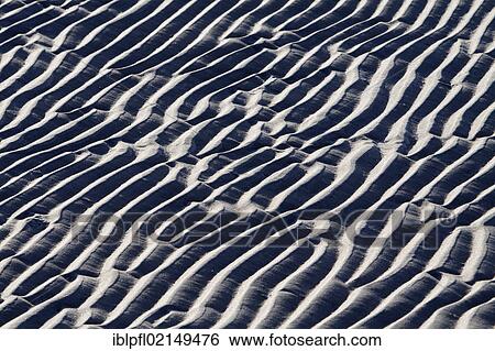 Tidal pattern with waves in the sand, sandy beach, North Sea, Sylt, Germany, Europe View Large Photo Image Stock Photograph - Tidal pattern with waves in the sand, sandy beach, North Sea, Sylt, Germany, Europe. Fotosearch