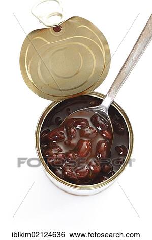 Stock Photograph - Tin can, opened can of black beans and spoon. Fotosearch