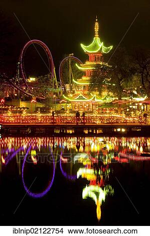 Tivoli by night, Copenhagen, Denmark, Europe View Large Photo Image Picture - Tivoli by night, Copenhagen, Denmark, Europe. Fotosearch