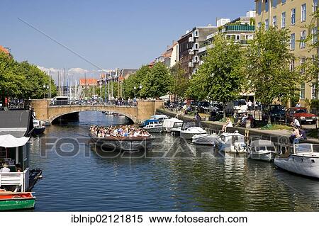 Tourboat in Christianshavns Canal, Copenhagen, Denmark, Europe View Large Photo Image Stock Photography - Tourboat in Christianshavns Canal, Copenhagen, Denmark, Europe. Fotosearch