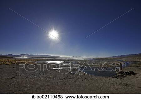 Stock Photo - Tourists bathing in hot springs, Aguas termales at the Laguna Salada, Altiplano, Potosi, southern Bolivia, South America. Fotosearch