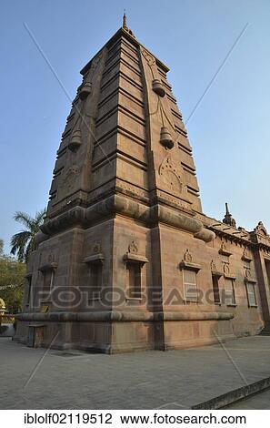 Stock Image - Tower of Kutti Vihar temple, Mulagandha Kuti Vihara, Buddhist pilgrimage destination, Sarnath, Varanasi, Uttar Pradesh, India, Asia. Fotosearch
