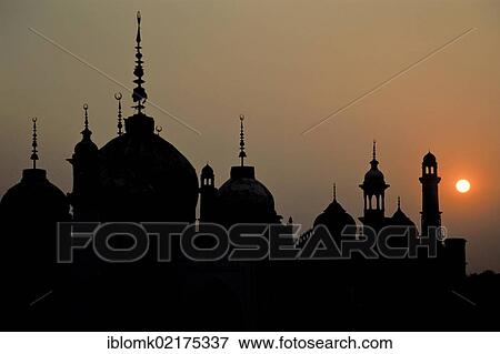 Stock Photo - Towers, minarets and domes against the light at sunset, Chota Imambara or Hussainabad Imambara, Lucknow, Uttar Pradesh, India, Asia. Fotosearch