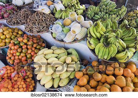 Tropical fruits on the morning market, Luang Prabang, Laos, Indochina, Asia View Large Photo Image Picture - Tropical fruits on the morning market, Luang Prabang, Laos, Indochina, Asia. Fotosearch