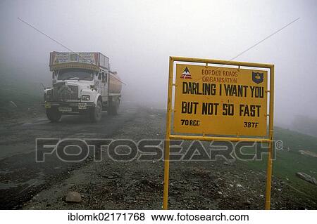 Stock Photo - Truck and a street sign, Manali-Leh-Highway near the Rohtang Pass, Himachal Pradesh, North India, India, Asia. Fotosearch