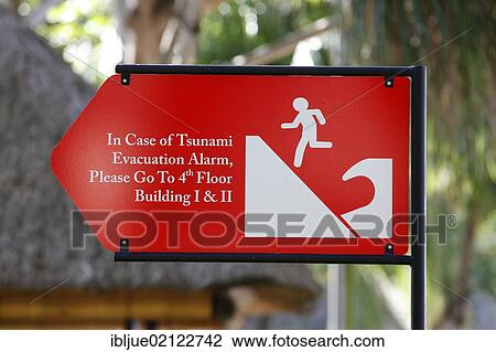 Stock Image - Tsunami warning sign in a hotel complex, Nusa Dua, Bali, Indonesia, Southeast Asia, Asia. Fotosearch