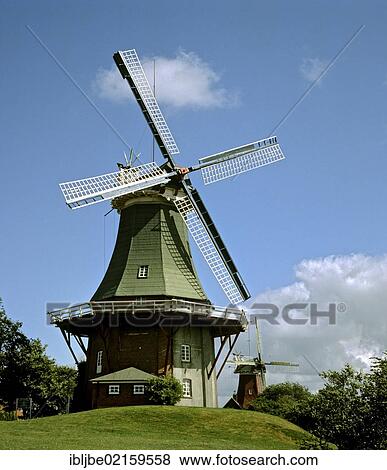 Stock Photo - Twin windmills Greetsiel-Ost and Greetsiel-West, village of Krummhoern, East Frisia, Lower Saxony, Germany, Europe. Fotosearch