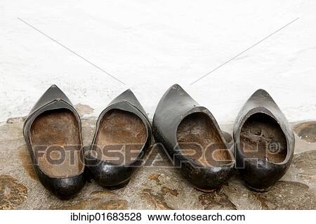 Two pairs of wooden shoes View Large Photo Image Stock Photo - Two pairs of wooden shoes. Fotosearch