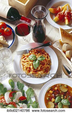 Typical Italian food, pasta, red wine View Large Photo Image Stock Photograph - Typical Italian food, pasta, red wine. Fotosearch