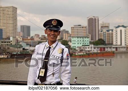 Uniformed security guard at Fort Santiago on the Pasig river, Manila, Philippines, Asia View Large Photo Image Stock Photograph - Uniformed security guard at Fort Santiago on the Pasig river, Manila, Philippines, Asia. Fotosearch