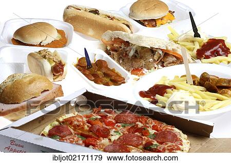 Various fast food meals, hamburgers, sausages, french fries, pizza, doner kebab, hot dog View Large Photo Image Stock Photo - Various fast food meals, hamburgers, sausages, french fries, pizza, doner kebab, hot dog. Fotosearch