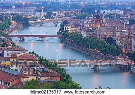 Stock Photo - Verona with Adige river at dusk, Veneto, Italy, Europe. Fotosearch