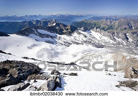 Stock Image - View from Hochfeiler Mountain, Pfitschertal, looking over Pfitschertal Valley, Valle Isarco and Wipptal and the Dolomites, Marmolada, Alto Adige, Italy, Europe. Fotosearch