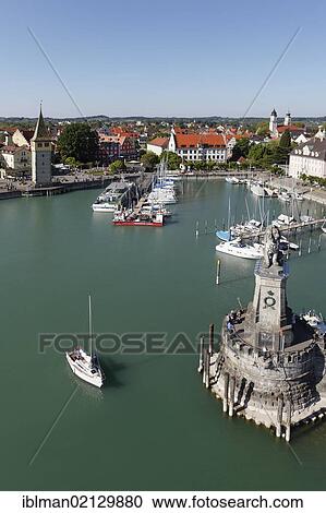 View from the lighthouse across the harbour with the Bavarian Lion, Lindau on Lake Constance, Swabia, Bavaria, Germany, Europe View Large Photo Image Stock Image - View from the lighthouse across the harbour with the Bavarian Lion, Lindau on Lake Constance, Swabia, Bavaria, Germany, Europe. Fotosearch