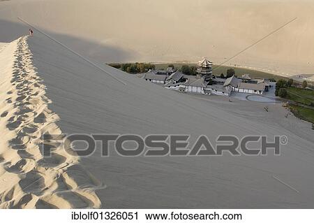 View from the sand dunes of the Gobi Desert to the Crescent Lake with a Chinese pagoda near Dunhuang, Silk Road, Gansu, China, Asia View Large Photo Image Stock Image - View from the sand dunes of the Gobi Desert to the Crescent Lake with a Chinese pagoda near Dunhuang, Silk Road, Gansu, China, Asia. Fotosearch