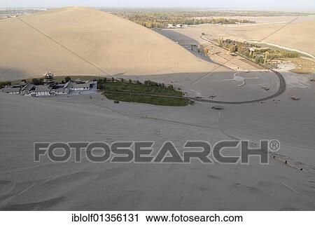 View from the sand dunes of the Gobi Desert on the Crescent Lake with Chinese Pagoda in Dunhuang, Silk Road, Gansu, China, Asia View Large Photo Image Stock Image - View from the sand dunes of the Gobi Desert on the Crescent Lake with Chinese Pagoda in Dunhuang, Silk Road, Gansu, China, Asia. Fotosearch
