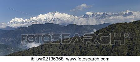 View from West Bengal, India towards Mount Kangchenjunga on the border between Sikkim and Nepal, Asia View Large Photo Image Stock Photo - View from West Bengal, India towards Mount Kangchenjunga on the border between Sikkim and Nepal, Asia. Fotosearch