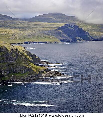 Stock Photo - View of Axarbjarg and Hornbjarg as seen from Smidjuvikurbjarg, east coast of Hornstrandir, Westfjords, Iceland, Europe. Fotosearch