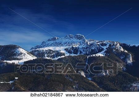 View of the Chiemgau Alps as seen from lake Chiemsee, Kampenwand massif, Bavaria, Germany, Europe View Large Photo Image Stock Photo - View of the Chiemgau Alps as seen from lake Chiemsee, Kampenwand massif, Bavaria, Germany, Europe. Fotosearch