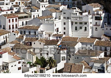 Stock Image - View over the rooftops of Setenil de las Bodegas, Pueblos Blancos, White Villages, Andalusia, Spain, Europe. Fotosearch